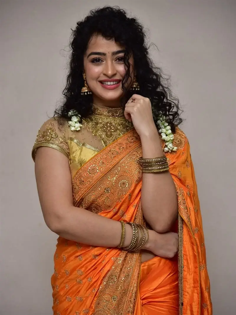 Actress Apsara Rani in Orange Saree at Talakona Movie Launch